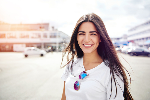 Woman smiling after LASIK eye surgery