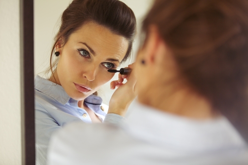 Woman using eye makeup after LATISSE