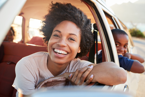 Young woman smiling after LASIK eye surgery