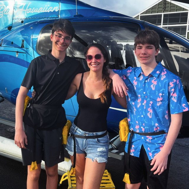 Dr. San Filippo with her sons before a helicopter tour